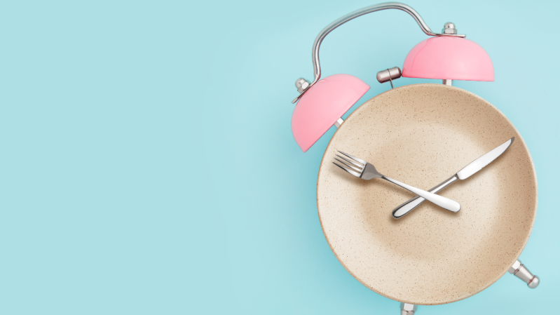 Alarm clock and plate with cutlery