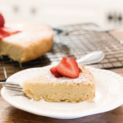 almond cake slice with sliced strawberries