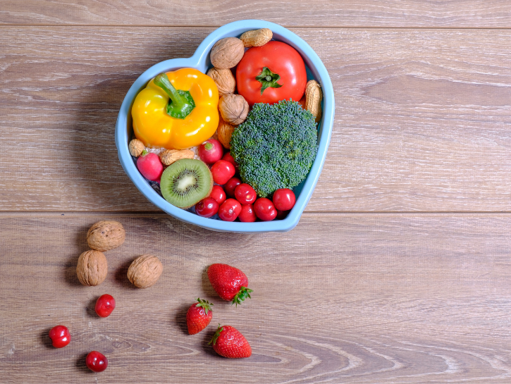 Assorted vegetables in heart shaped container