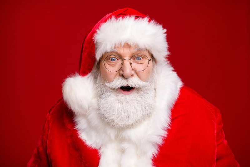 bespectacled Santa with mouth agape