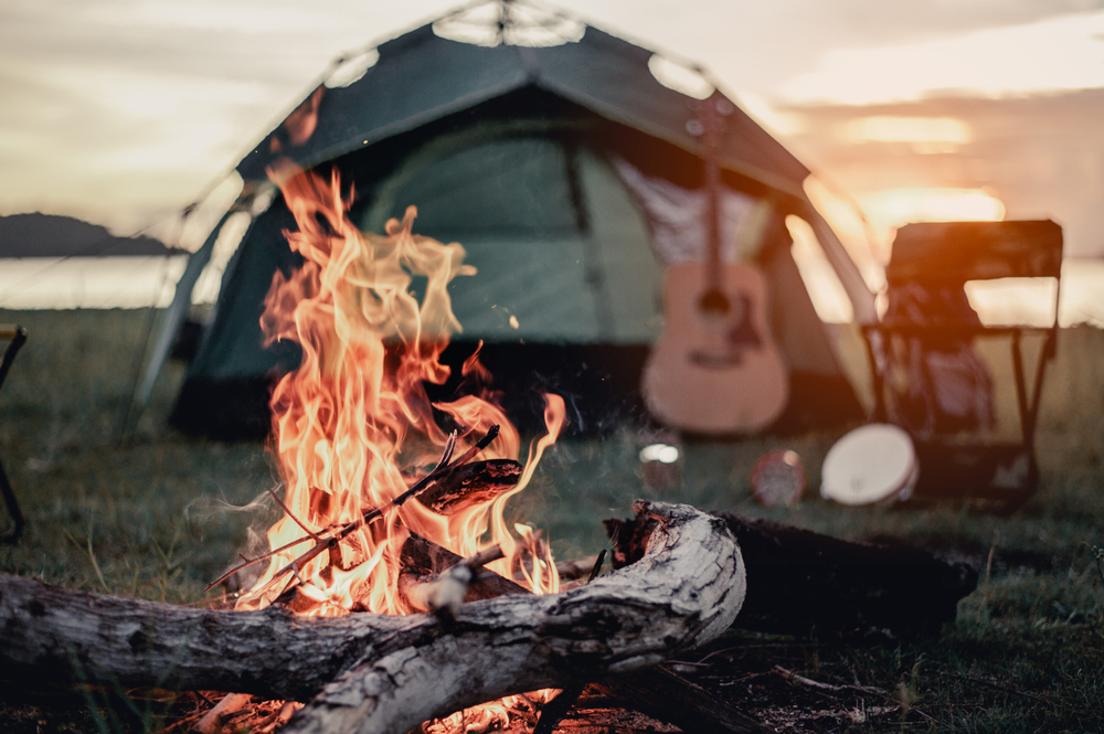 Camp fire and a tent