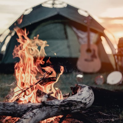 Camp fire and a tent