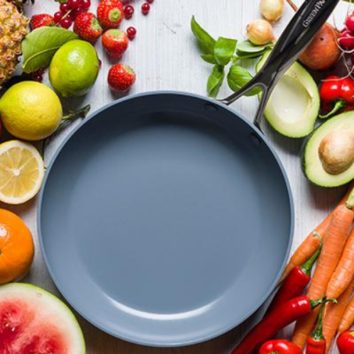 Ceramic coated pan among fruits and vegetables