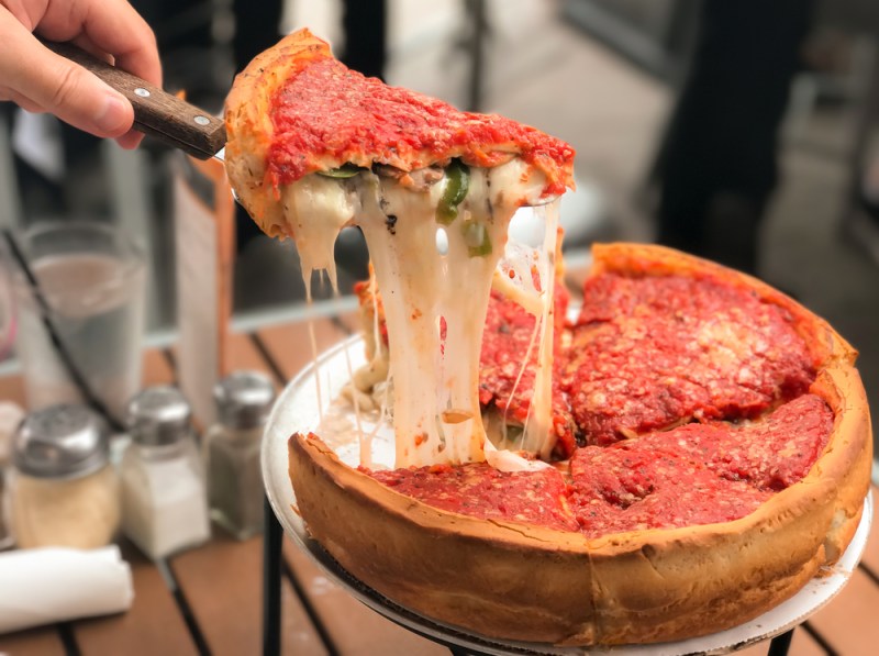 cheesy slice of Chicago style deep dish pizza
