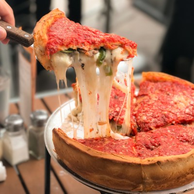 cheesy slice of Chicago style deep dish pizza