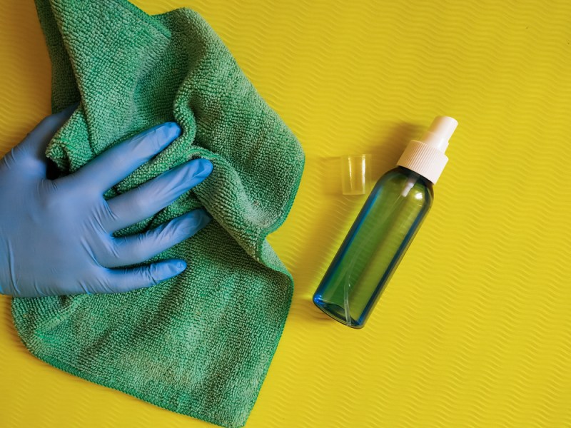 cleaning of yoga mat with disinfectant. disinfect yoga mat