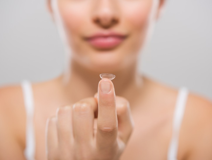 contact on woman's finger