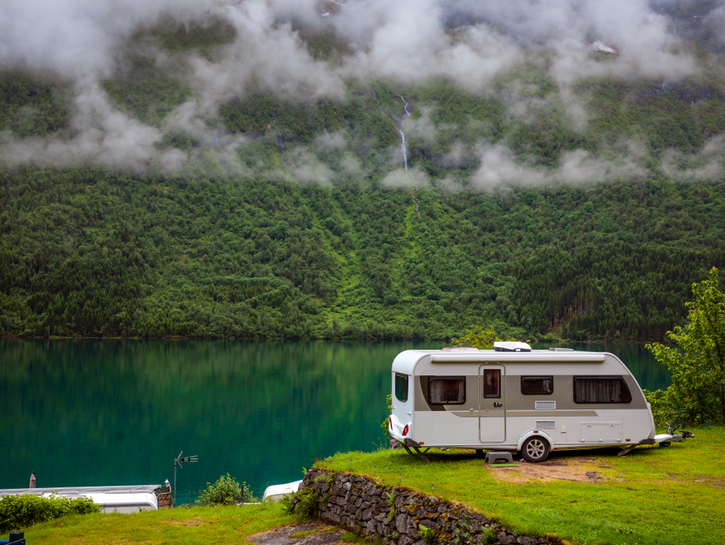 Family vacation travel RV, holiday trip in motorhome, Caravan car Vacation. Beautiful Nature Norway natural landscape