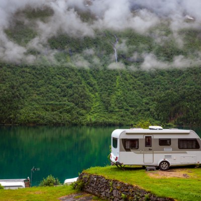 Family vacation travel RV, holiday trip in motorhome, Caravan car Vacation. Beautiful Nature Norway natural landscape