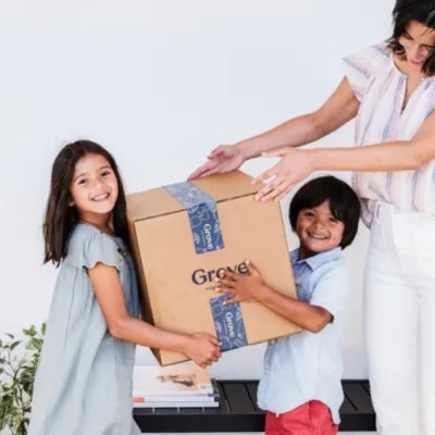 family with a Grove Collaborative box