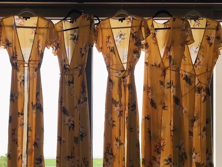 hanging yellow wrap dresses