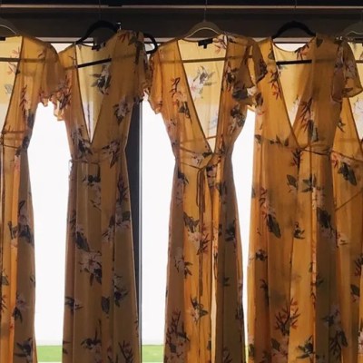 hanging yellow wrap dresses