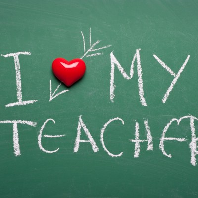 "I heart my teacher" written on chalkboard