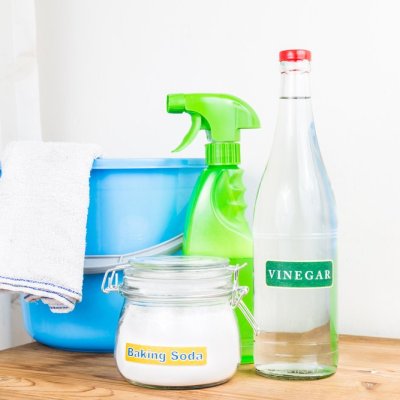 Low angle view of baking soda with vinegar, natural mix for effective house cleaning