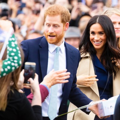 MELBOURNE, AUSTRALIA - OCTOBER 18: Prince Harry, Duke of Sussex and Meghan Markle, Duchess of Sussex meet fans at Government House in Melbourne, Australia