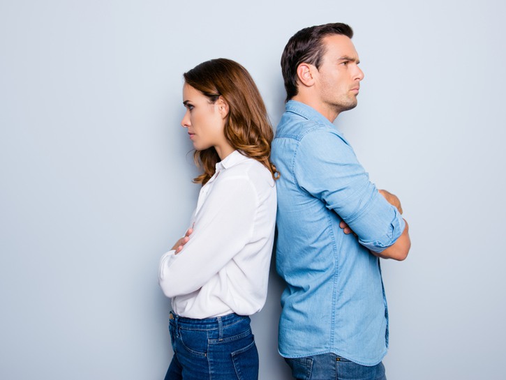 men and woman back to back