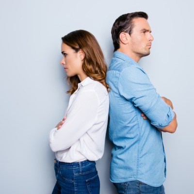 men and woman back to back