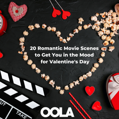 Movie clapper board, popcorn heart, gift box, candles and other love objects on black background with copy space. Valentine's Day, date and romantic evening concept. Love story movies.