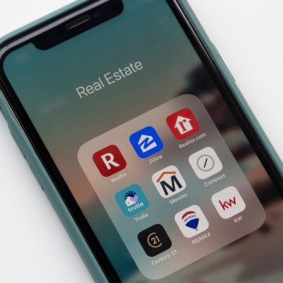 Portland, OR, USA - Feb 2, 2021: Assorted real estate apps are seen on an iPhone, including Redfin, Zillow, Realtor.com, Trulia, Movoto, Compass, Century 21, REMAX, and KW.