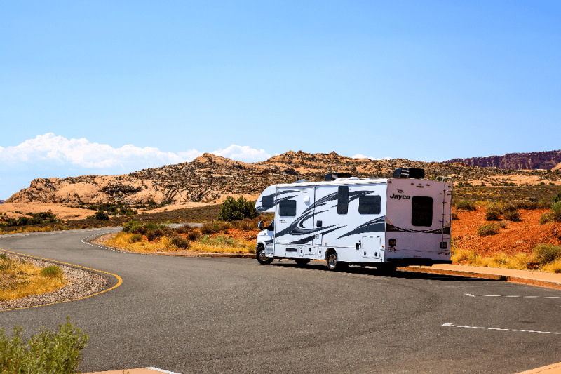 rv driving through the desert
