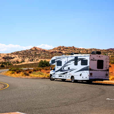 rv driving through the desert