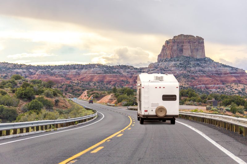 RV on the road, family road trip, mountains