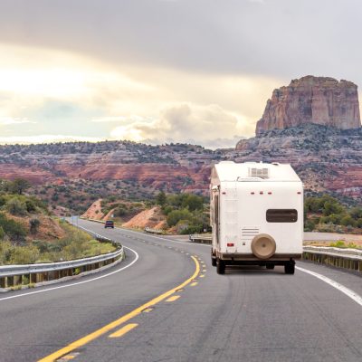 RV on the road, family road trip, mountains