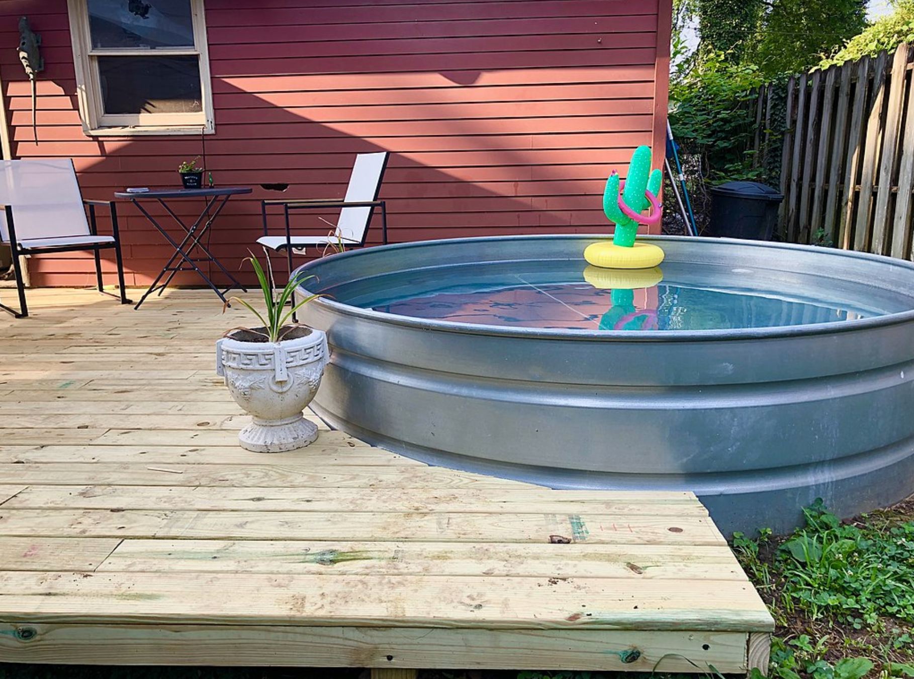 Stock tank pool outside in backyard