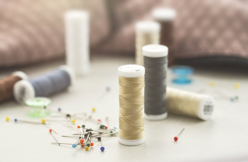 Thread and pins for sewing project