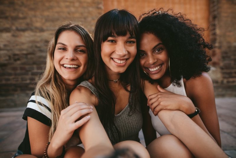 three girlfriends taking a selfie