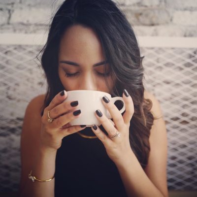 Woman drinking hot tea