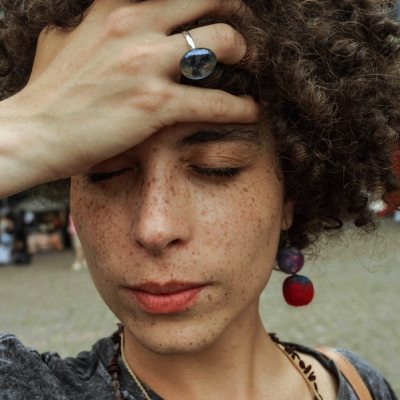 woman holding her head