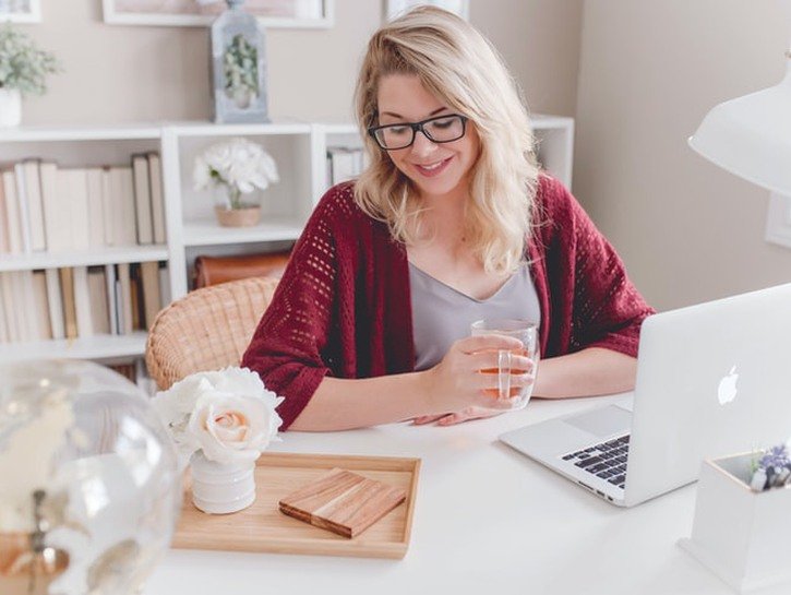 woman smiling in home office