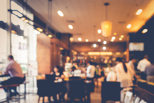 Blur coffee shop or cafe restaurant with abstract bokeh light image background.For montage product display or design key visual layout