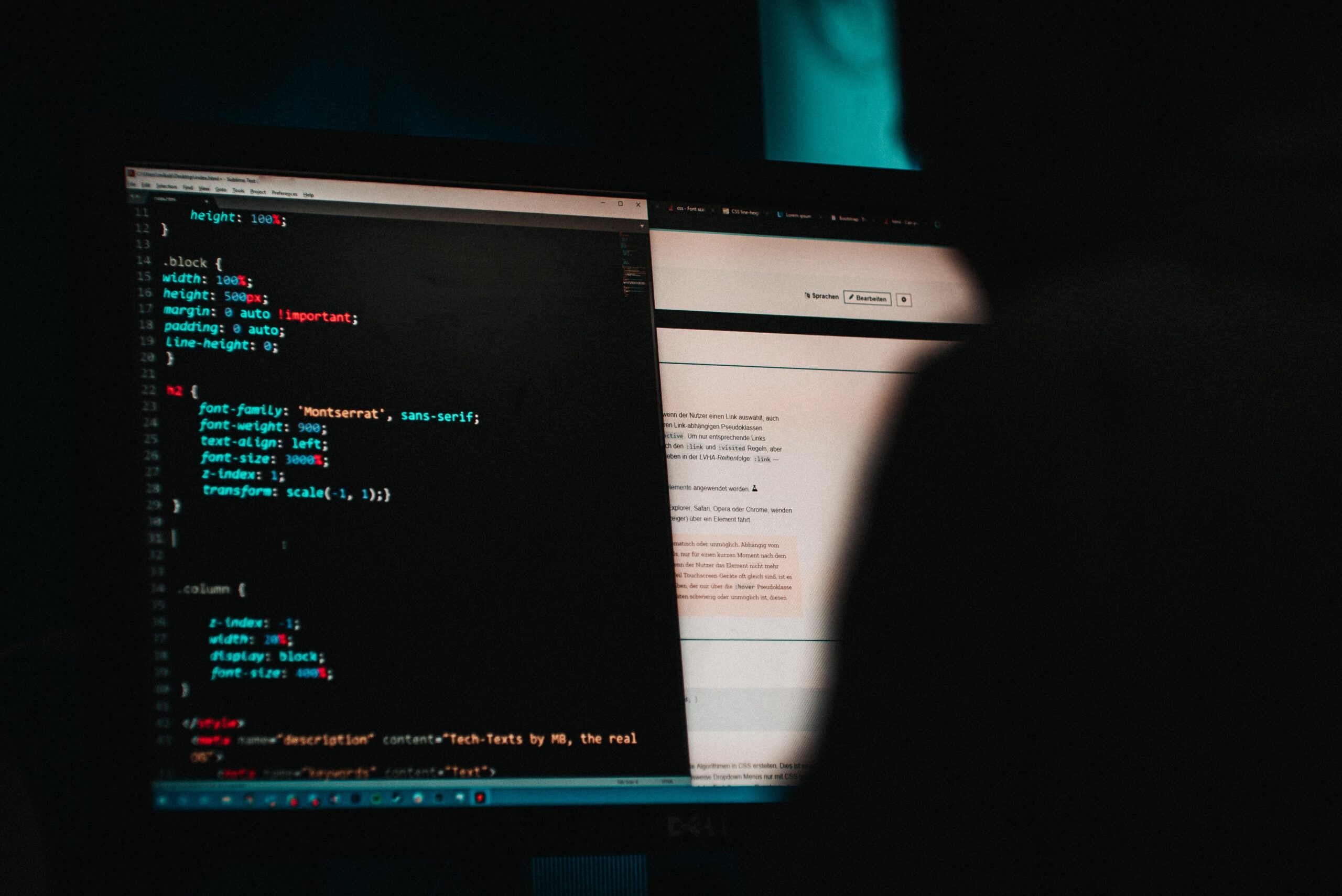 Someone programming a website in HTML. But also a photo suitable for hackers. ;)
