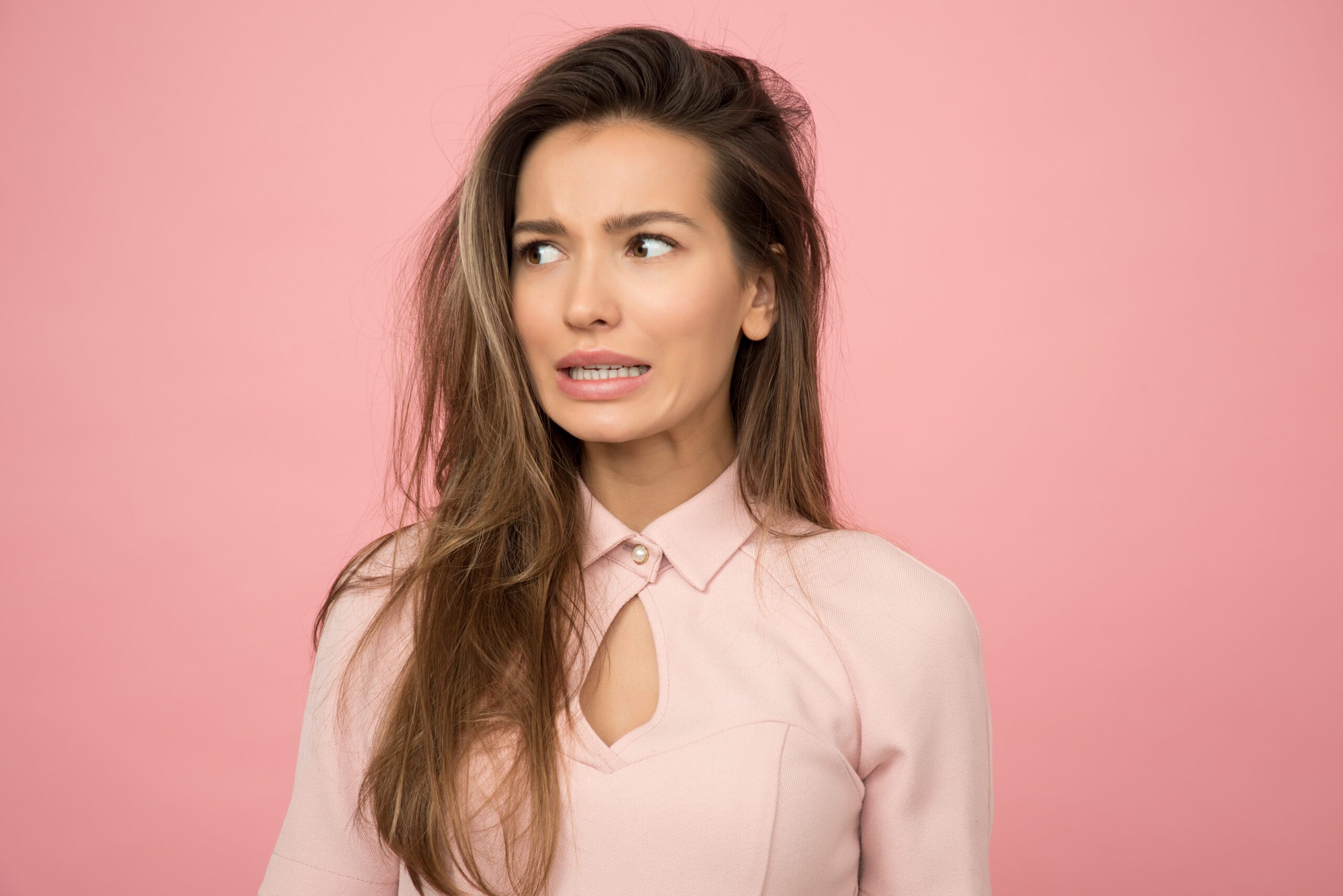 Woman wearing pink top