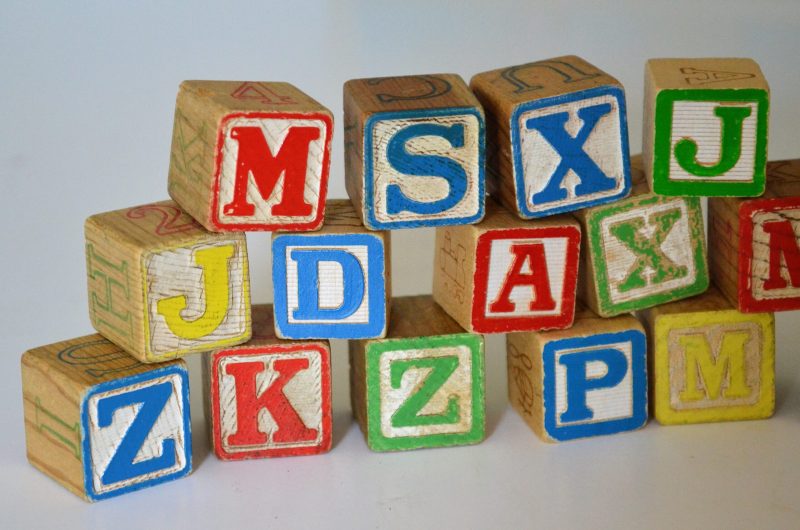 My grandma kept one small cardboard box of toys at her house for the grandkids. It contained wooden blocks just like these—not a whole set, just a few. It always seemed like plenty to us.