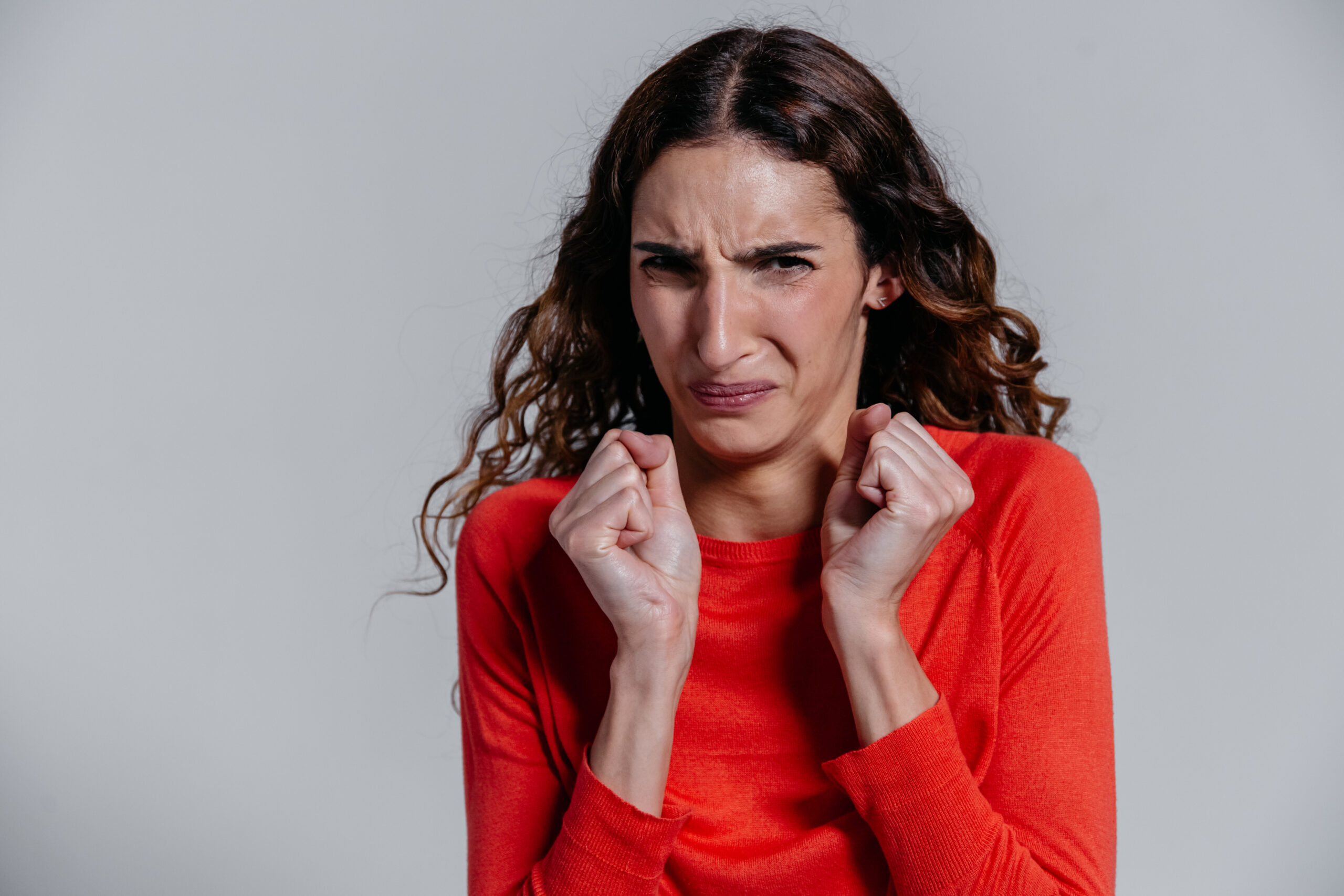 A woman with a disgusted facial expression