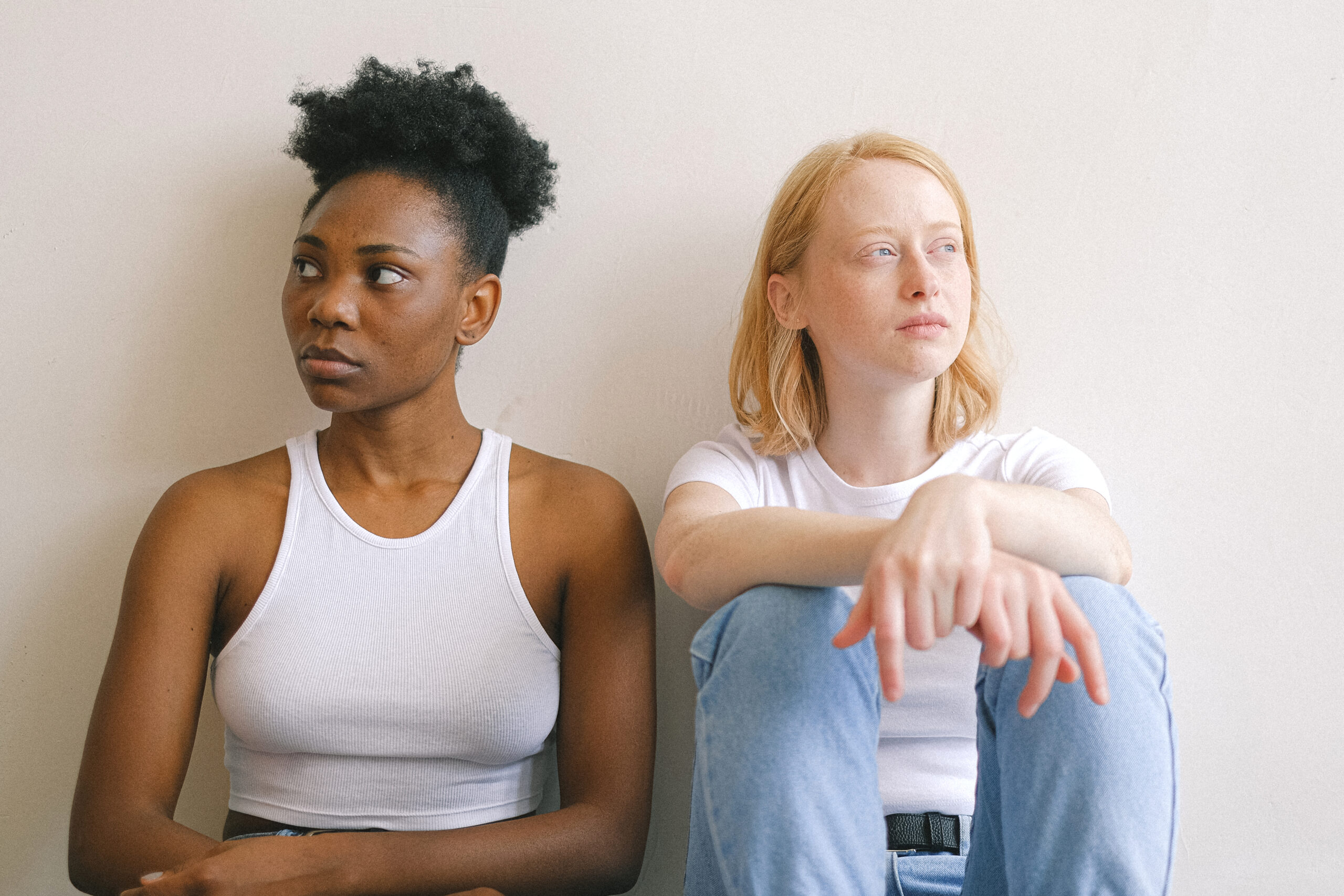Women sitting close together