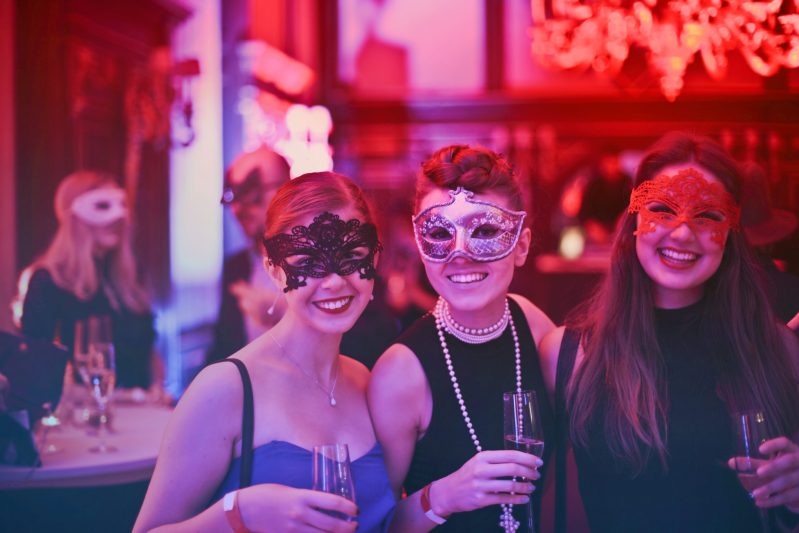 Photo of women wearing masks