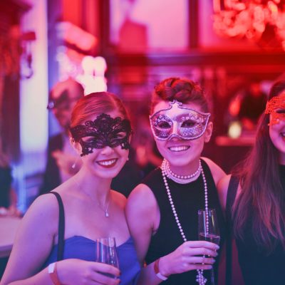 Photo of women wearing masks