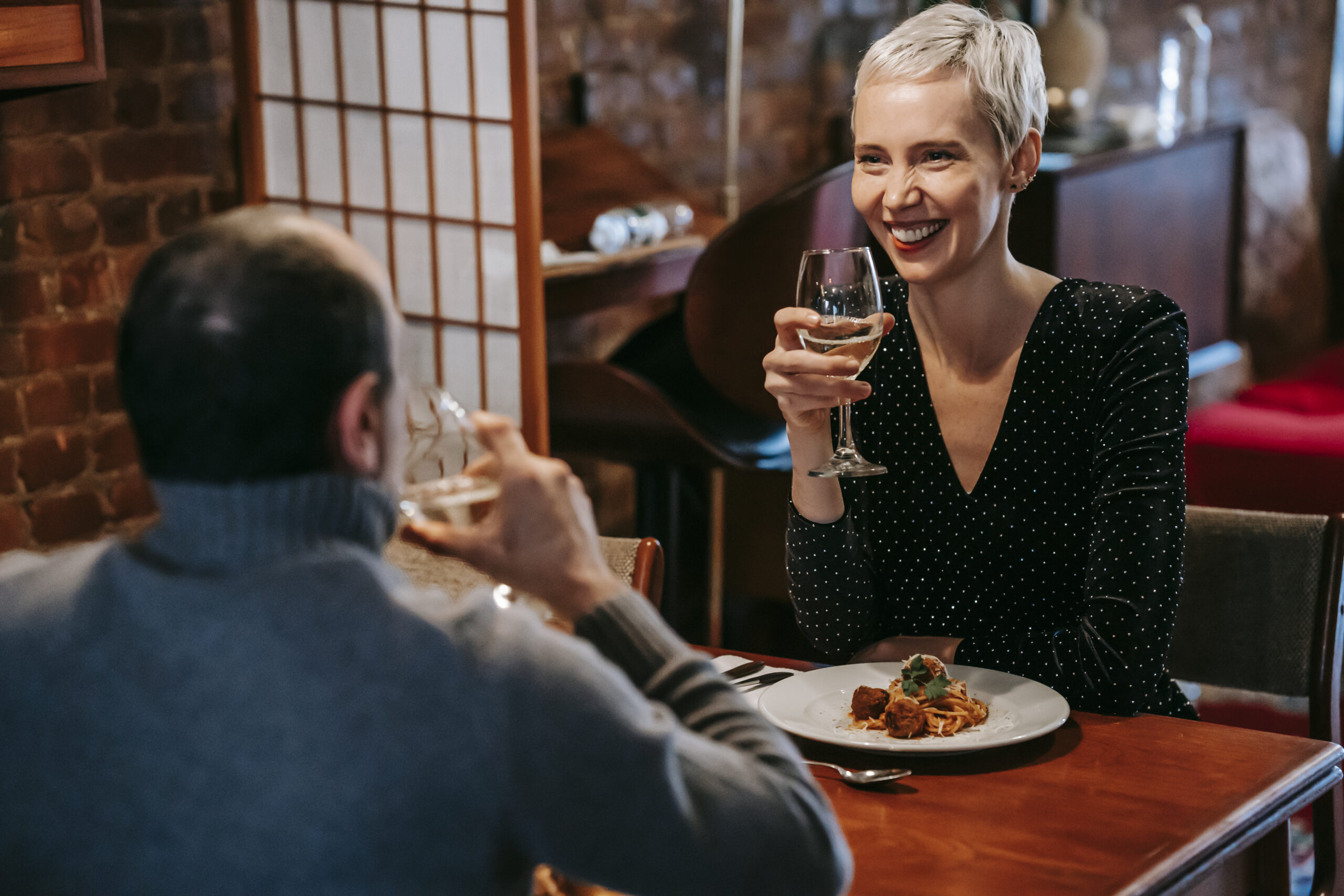Smiling woman holding a wine glass